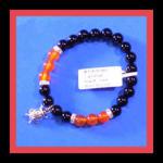 Bracelets: Stretchy Carnelian and Black Onyx 8mm with a Ladybug  30438348N, 3 for $15