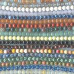 Rounds:  4mm Semi-Precious Mix, Our Basic Mix, 100 Strands, 15 - 16 inches mostly