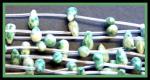 Briolettes: Faceted 5 x 10mm Jadeite Strands 15 - 16 inches