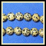 Rounds: Dalmatian Stone 10mm by the Strand 15 - 16 inches
