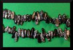 Dogtooth:  Snowflake 15 - 16 inch strands