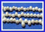 Freshwater Pearls: Headdrilled 4 - 5mm Mostly White 15 - 16 inch strands, 3 for $12
