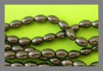 Hematite Rice: 7 x 10mm  15 - 16 inches, $1 per strand