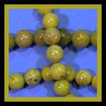 Rounds: Jade, Canadian, 10mm Strands 15 - 16 inches