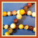 Rounds: Mookaite 10mm by the Strand 15 - 16 inches