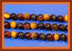 Rounds: Tigereye Multi  6mm by the Strand 15 - 16 inches