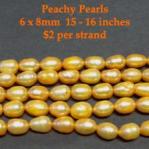 Pearls: Peachy (Orangey) 6 x 8mm Rice 15 - 16 inches