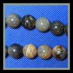 Rounds: Picasso Stone 14mm  Strands 15 - 16 inches
