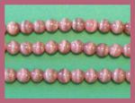 Rounds: Rhodocrosite 6mm by the Strand 15 - 16 inches