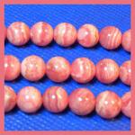 Rounds: Rhodocrosite 8mm by the Strand 15 - 16 inches