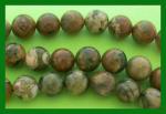 Rounds: Rhyolite 10mm by the Strand 15 - 16 inches