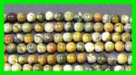 Rounds: Rhyolite  4mm by the strand 15 - 16 inches